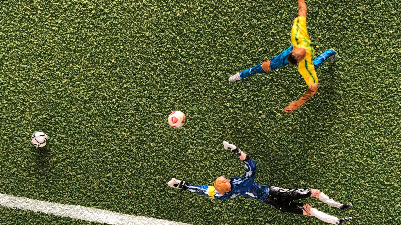 Sculpture of soccer game