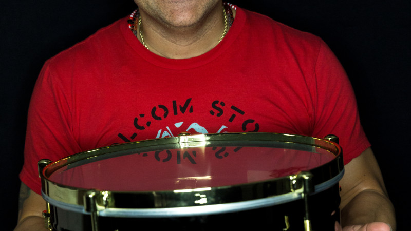 Photo of musician with drum