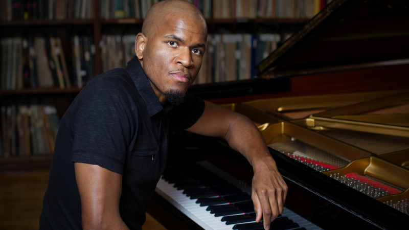 Photo of man at piano
