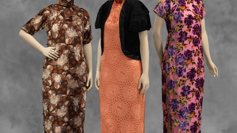 Three mannequins with colorful dresses