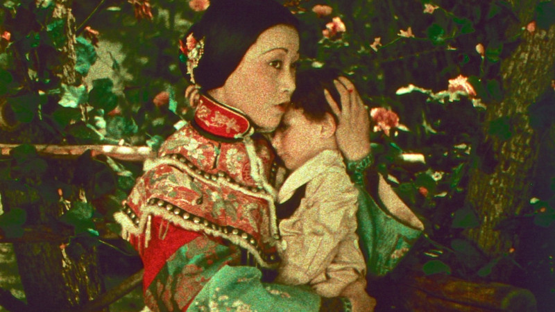 Film still of woman and child