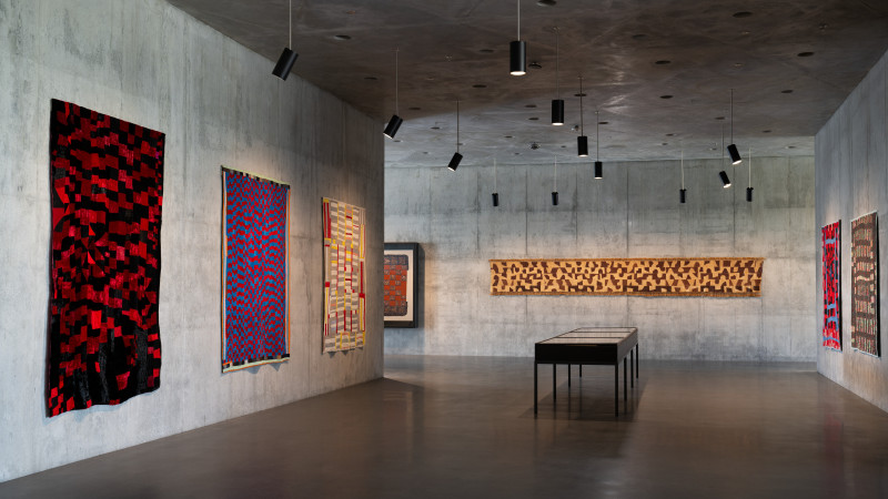 photograph of a gallery with artworks