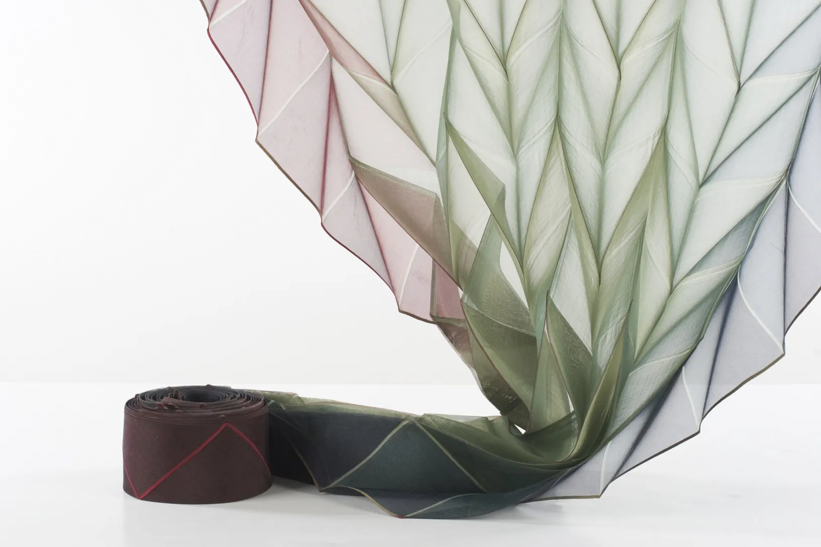 <p>Reiko Sudō, Hiroko Kobayashi, and Mizue Okada for NUNO in collaboration with Takekura Co., Ltd., <em>Origami Pleats</em>, 1997, Los Angeles County Museum of Art, gift of Grace Tsao, © NUNO Corporation, photo © Museum Associates/LACMA</p>