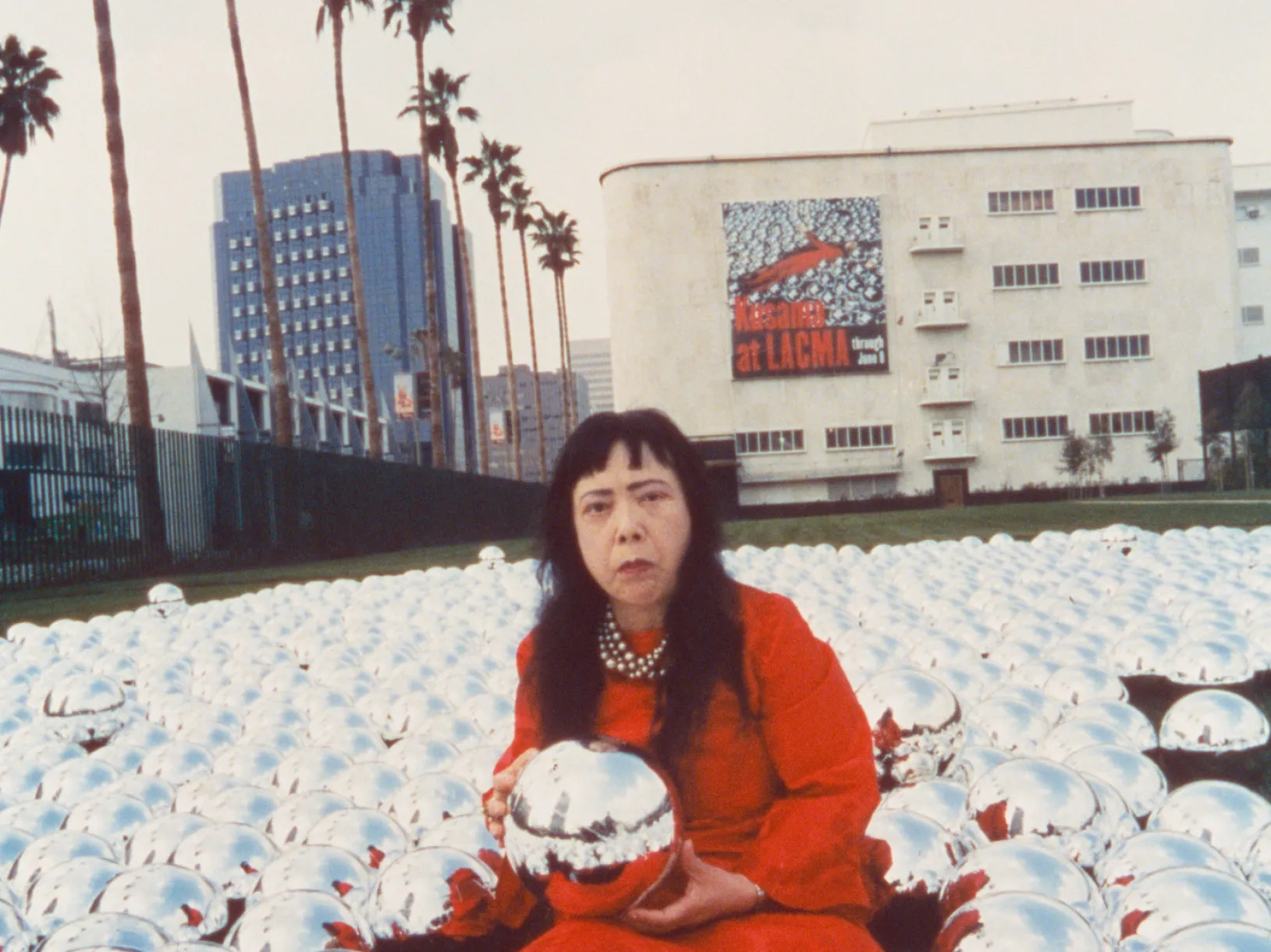<p>Yayoi Kusama at LACMA, 1998, © Yayoi Kusama, photo © Museum Associates/LACMA</p>