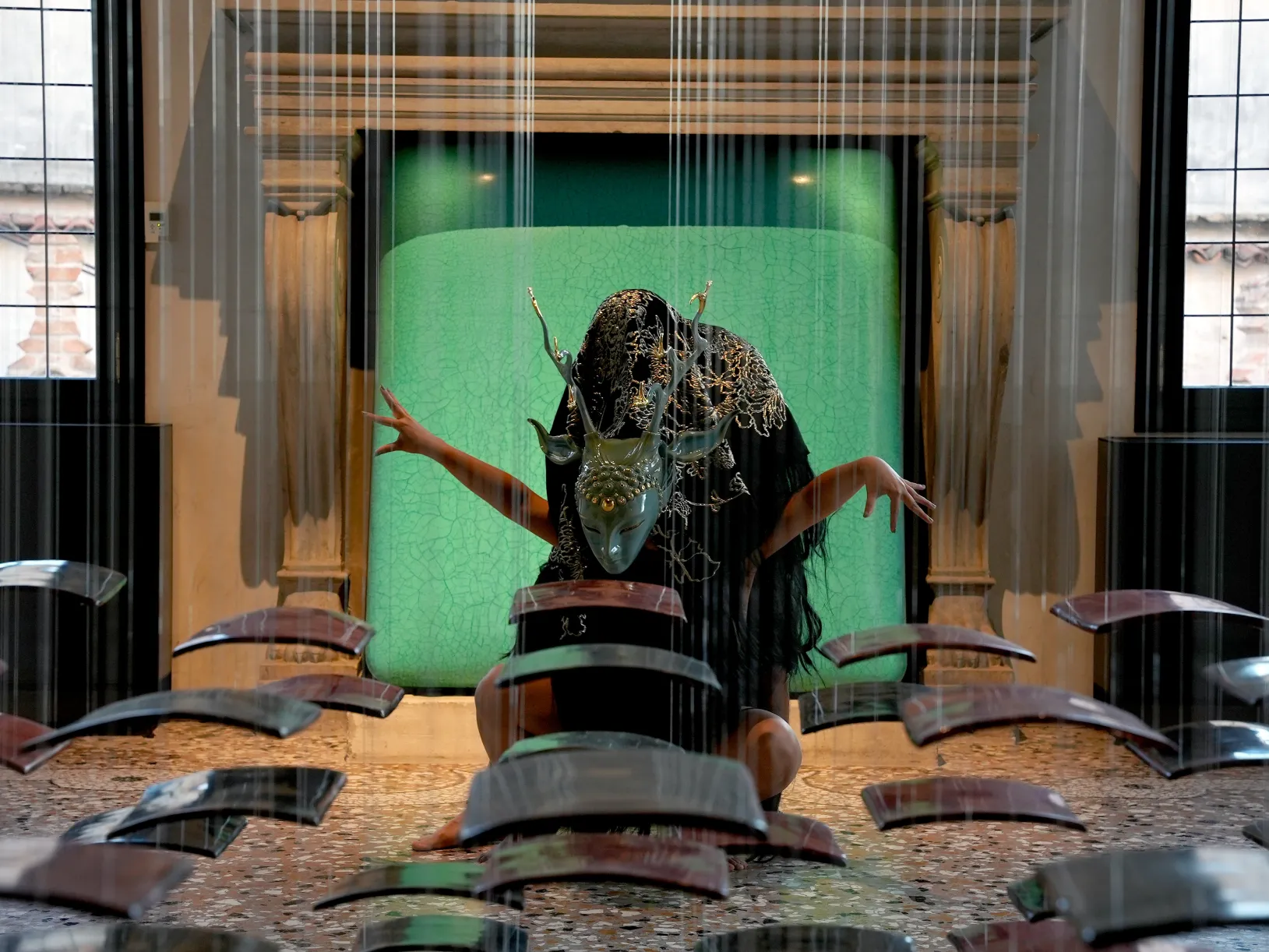 <p>Kyoko Takenaka and Andrew Thomas Huang perform amid Su Xiaobai's installation "300 poems," courtesy Su Xiaobai Foundation, photo by Vivian Wenli Lin</p>