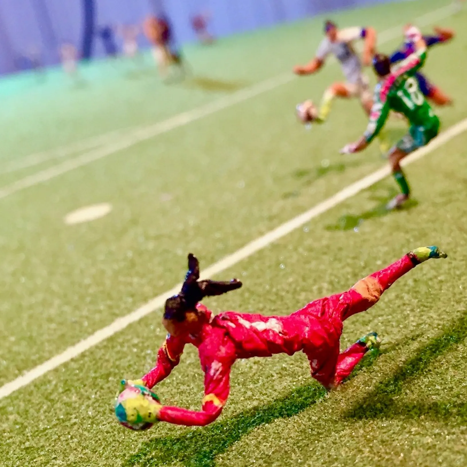 Lyndon J. Barrois, Sr., U.S. goalkeeper Hope Solo dives for a decisive save against Australia, 2015, detail of Fútballet, 2018, courtesy of the artist.
